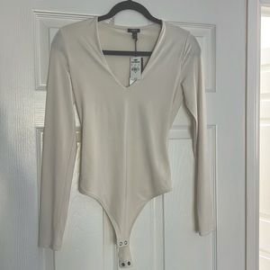 NWT Express white long sleeve bodysuit XS